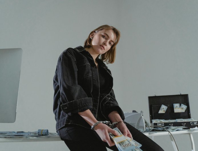 Police arrested a youth carrying Rs 50 lakh in cash, and are now investigating his identity and financial transactions.